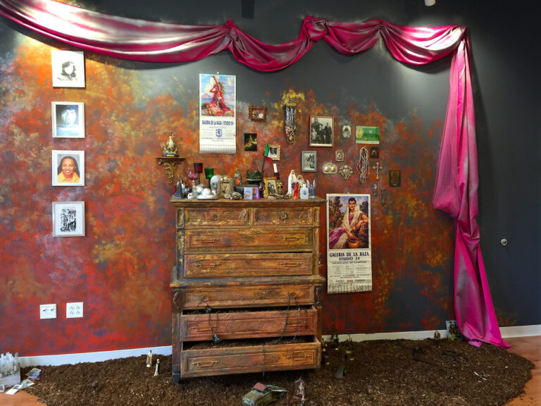 2015 (installation view from Caribbean Cultural Center, New York, NY, 2016), dresser, miscellaneous objects, constructed chair, wall and ceiling drapes, app. size: 10 x 15 x 6 feet