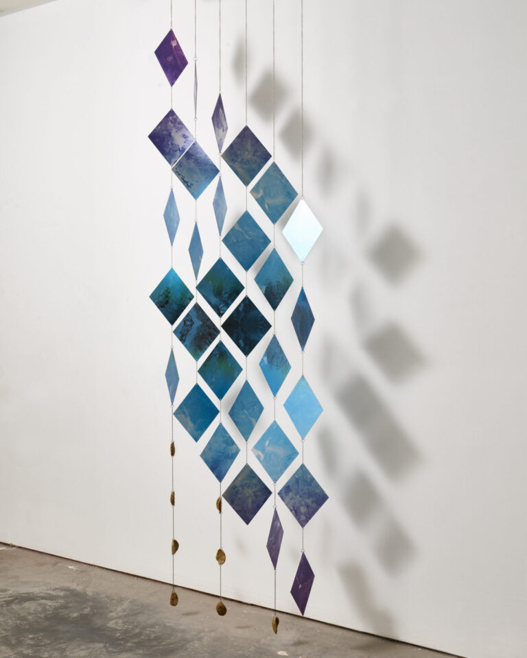 Rachelle Reichert, Spectral, 2024, Archival pigment prints on aluminum, brass, wild ceramic, walnut, 117 x 48 in.